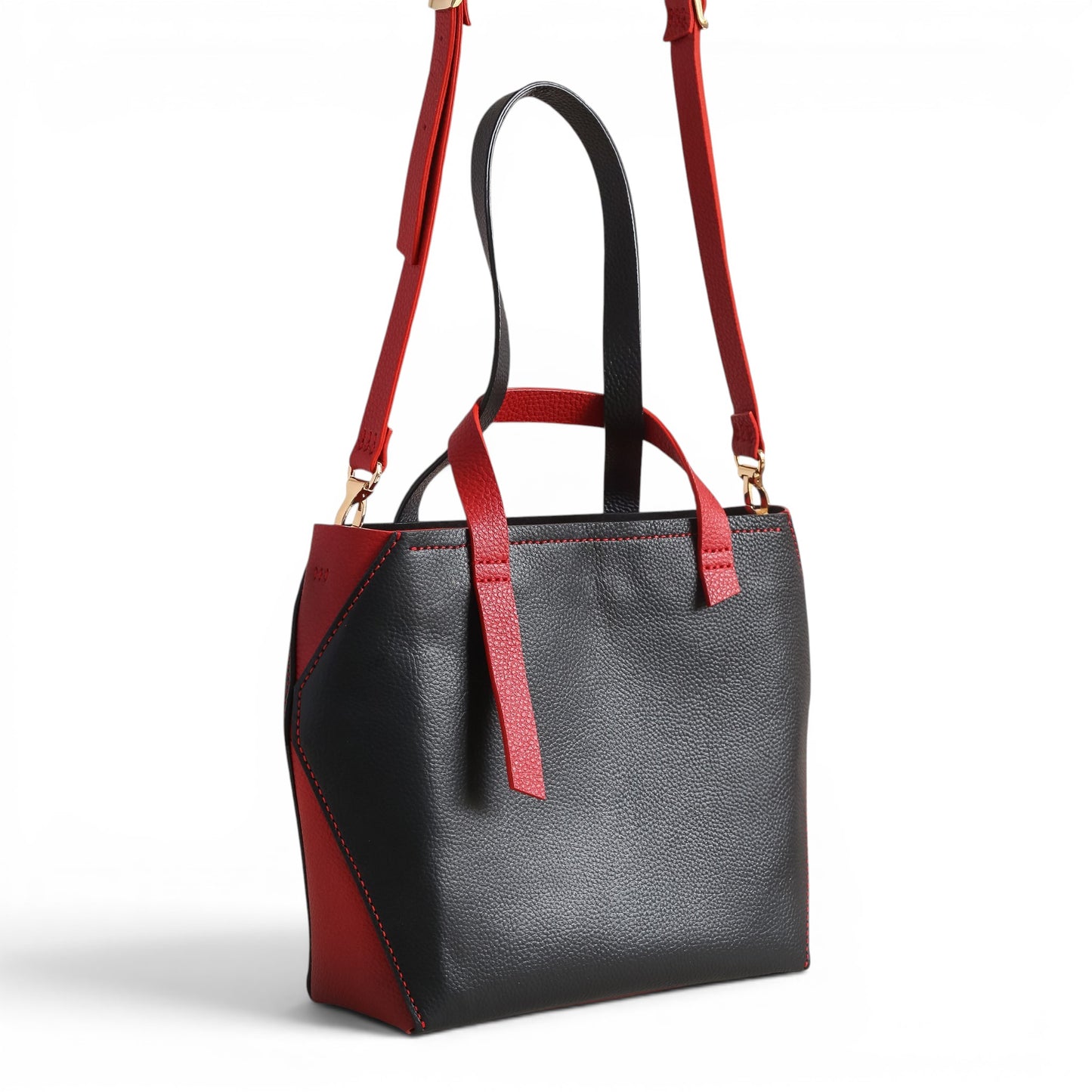 Black leather handbag with handles and strap