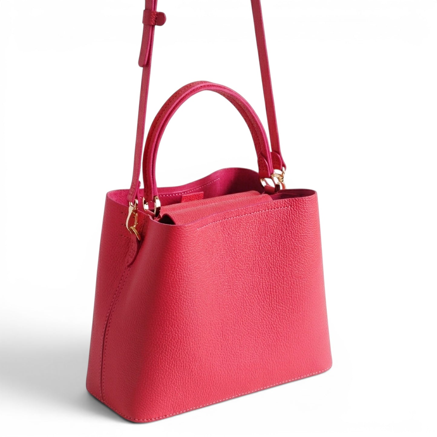 Coral leather handbag with handle and crossbody strap
