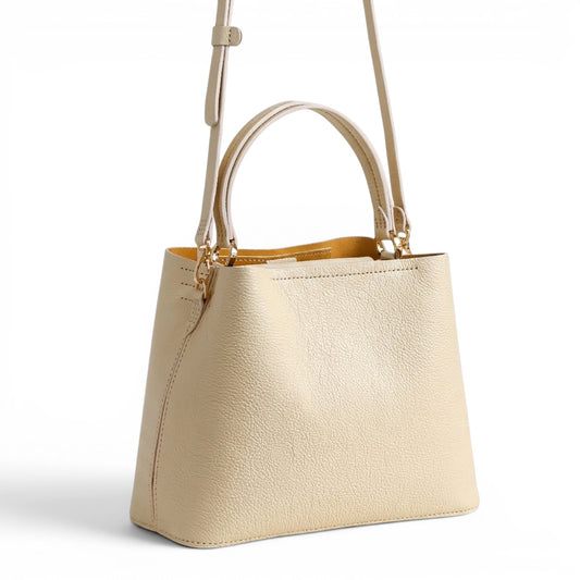 Cream leather handbag with a strap and handle