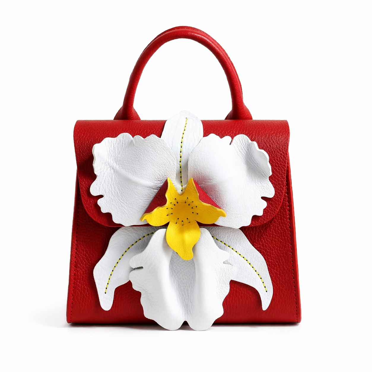 Red full grain leather handbag with a large white orchid flower