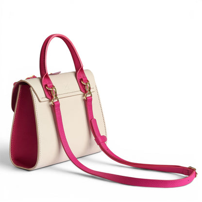 Handbag with pink strap and handle 