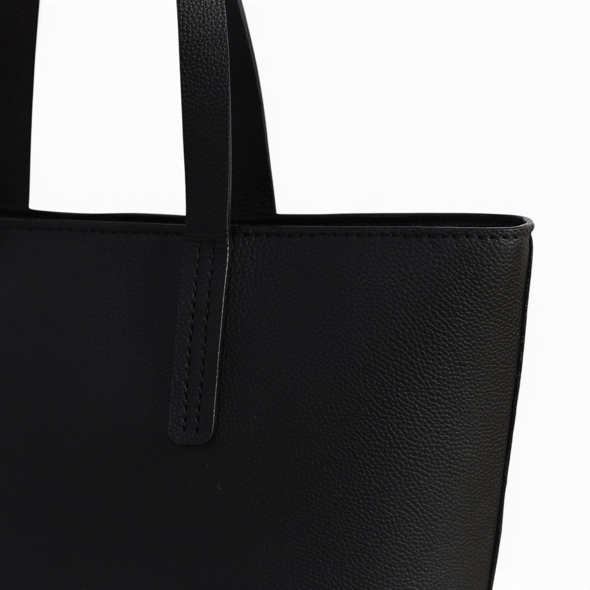 Close-up of a black leather shoulder bag 