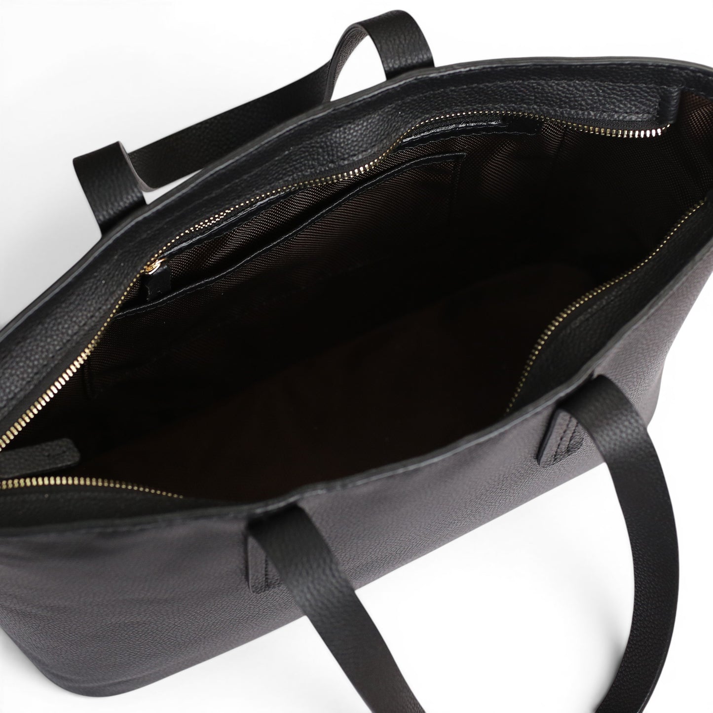Black leather bag with gold zipper 