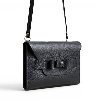 Black clutch bag with a bow detail