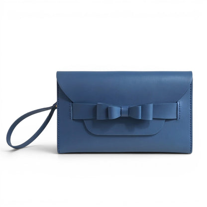 Blue leather clutch bag with a bow