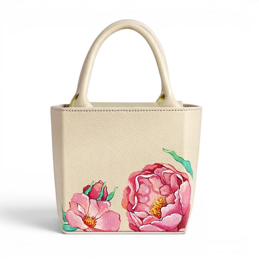 Cream leather handbag with pink floral design