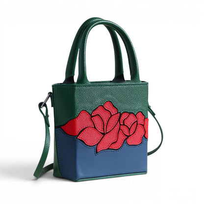Leather handbag with red floral design 
