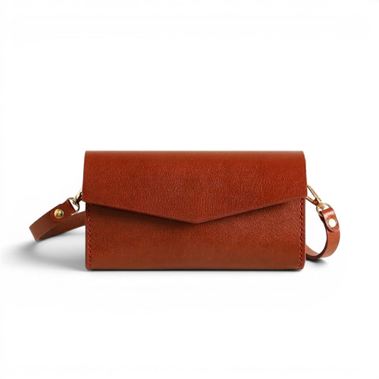 Brown leather clutch bag with a strap