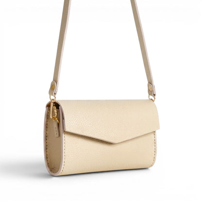 Cream Leather handbag with a strap 