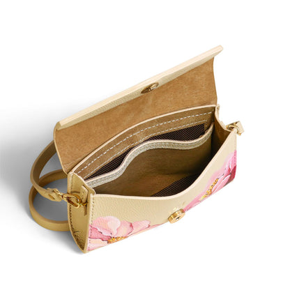 Inside of Small beige handbag with floral design