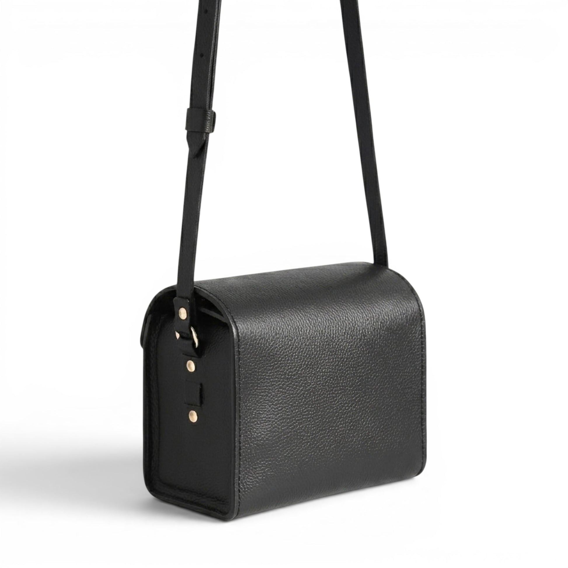 Black leather handbag with a strap