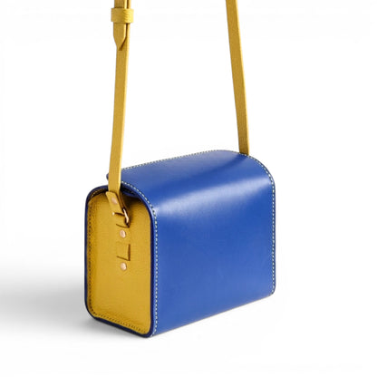 Blue and yellow leather crossbody bag with strap