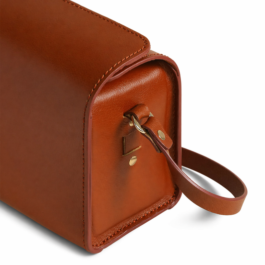Brown leather crossbody bag with a strap