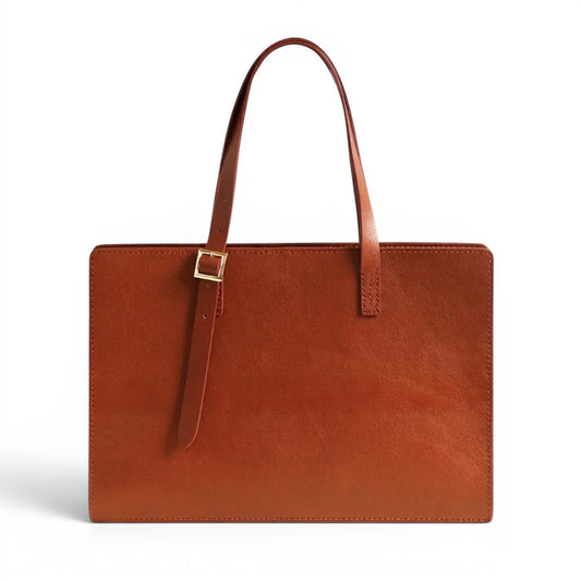 Brown leather shoulder bag with a strap