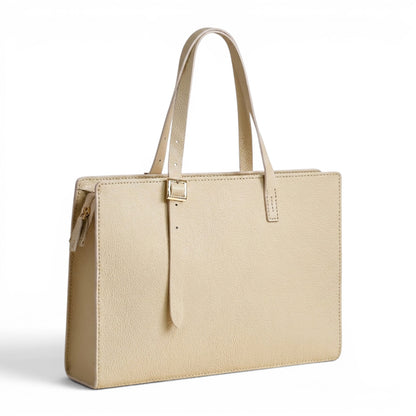 Cream leather handbag with a strap 